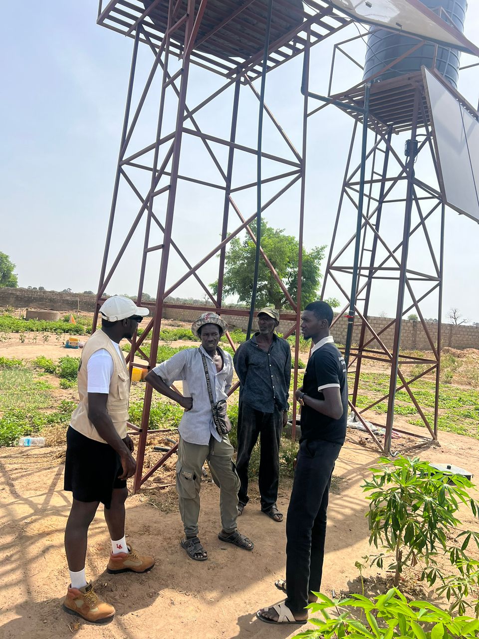 Irrigation specialists monitoring canal sensors